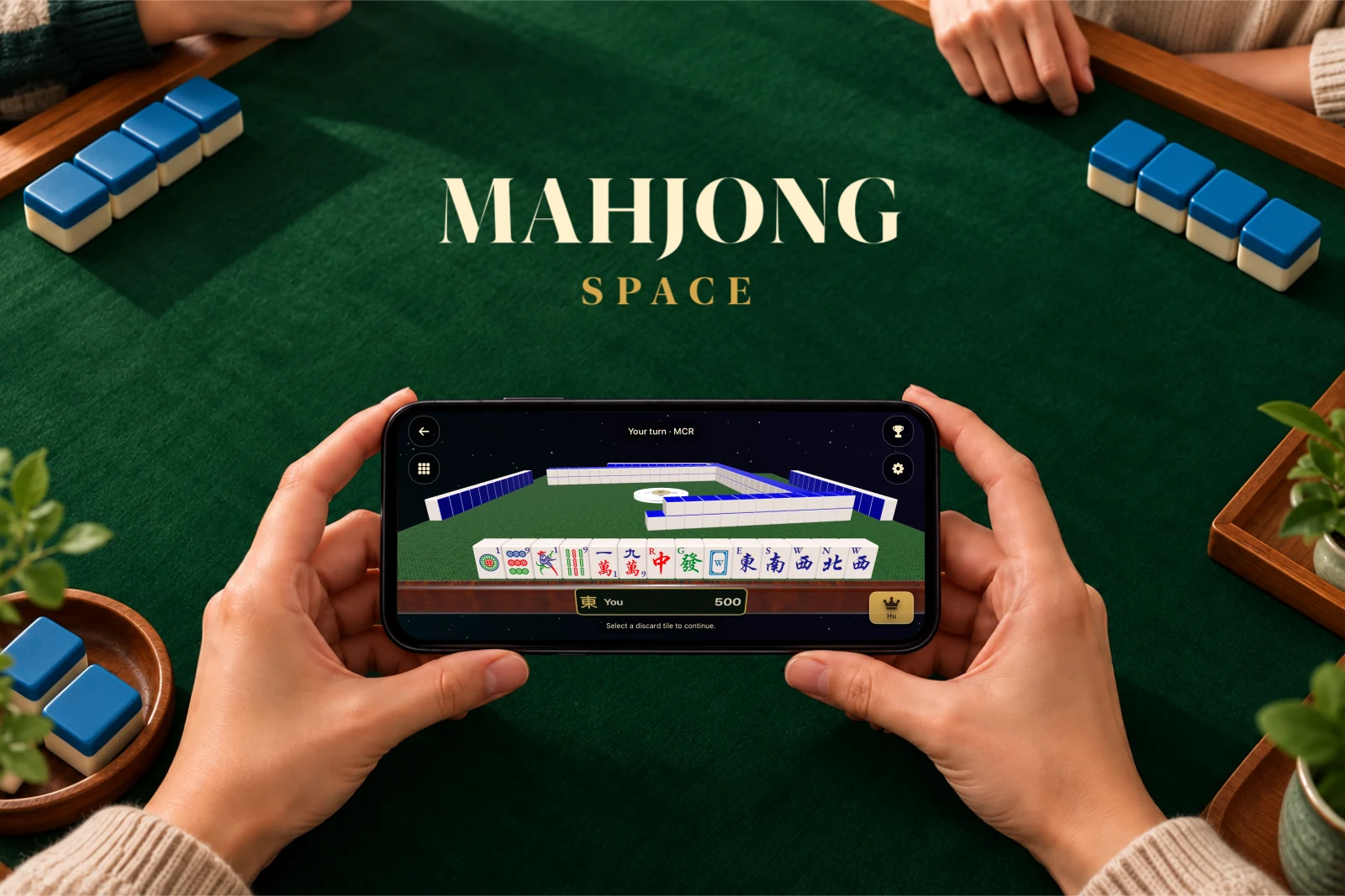 Mahjong Space gameplay held in two hands above a green felt Mahjong table